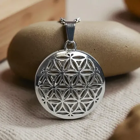 Pendentif Fleur de vie et cristal de roche - Énergie et clarté