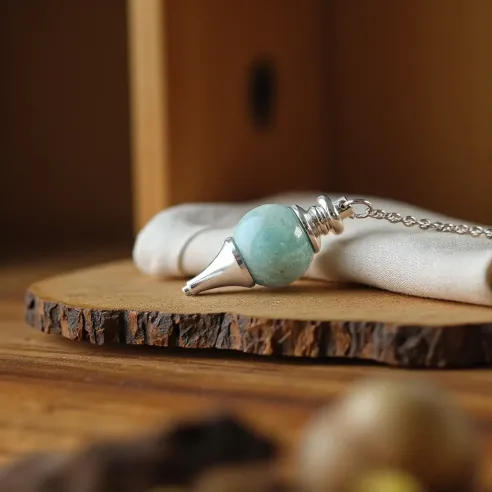 Pendule boule amazonite – radiesthésie & chakra gorge
